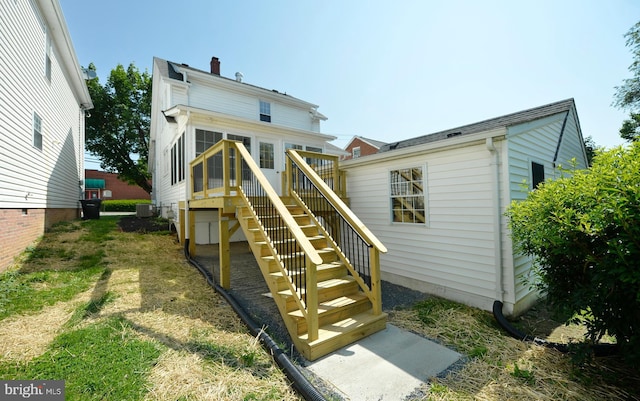 31 W Whitlock Ave, Winchester, VA 22601 - back of property featuring stairs, a chimney, and central AC unit