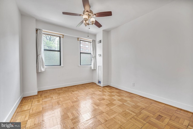 2515 K St NW Unit 205, Washington, DC 20037 - empty room with baseboards and ceiling fan