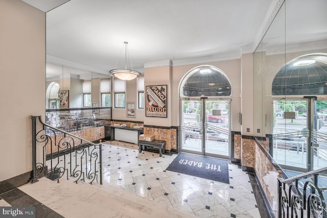 2515 K St NW Unit 205, Washington, DC 20037 - foyer entrance with ornamental molding and a wainscoted wall