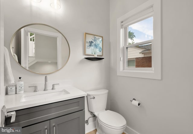 5421 4th St S, Arlington, VA 22204 - half bathroom featuring toilet, vanity, and baseboards