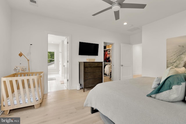 5421 4th St S, Arlington, VA 22204 - bedroom with a spacious closet, a closet, light wood-style floors, baseboards, and recessed lighting