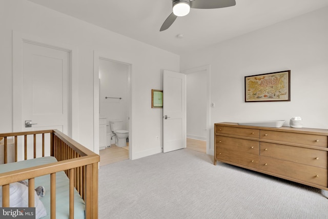5421 4th St S, Arlington, VA 22204 - bedroom with light carpet, ensuite bathroom, a ceiling fan, and baseboards