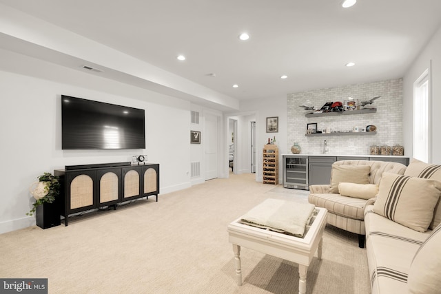 5421 4th St S, Arlington, VA 22204 - living area featuring beverage cooler, a dry bar, recessed lighting, light colored carpet, and baseboards
