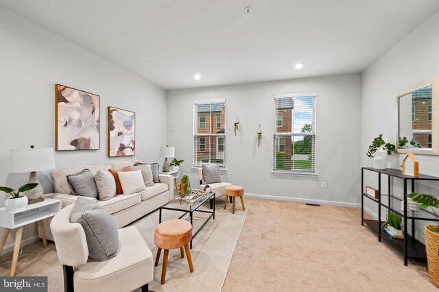 229 S Macon St, Baltimore, MD 21224 - living area with light carpet, recessed lighting, and baseboards