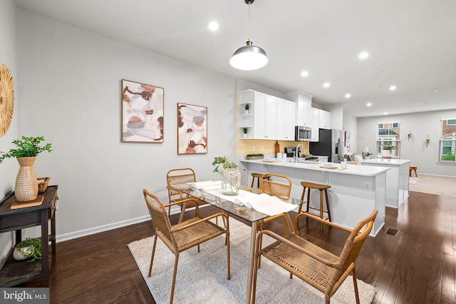 229 S Macon St, Baltimore, MD 21224 - dining space with baseboards, dark wood finished floors, and recessed lighting