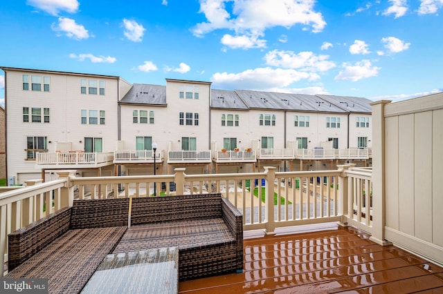 229 S Macon St, Baltimore, MD 21224 - wooden terrace featuring a residential view