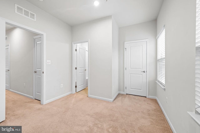 229 S Macon St, Baltimore, MD 21224 - unfurnished bedroom with carpet flooring and baseboards