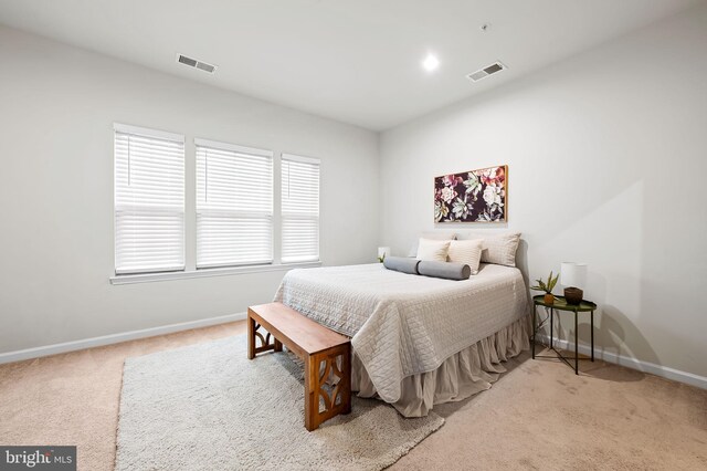 229 S Macon St, Baltimore, MD 21224 - carpeted bedroom featuring baseboards