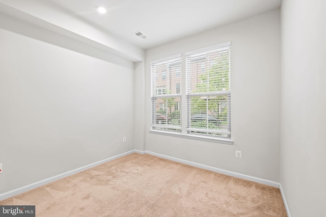 229 S Macon St, Baltimore, MD 21224 - carpeted empty room featuring baseboards