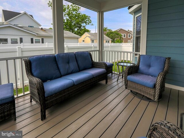 37529 Atlantic Ave Unit 11, Rehoboth Beach, DE 19971 - wooden deck with outdoor lounge area and a residential view