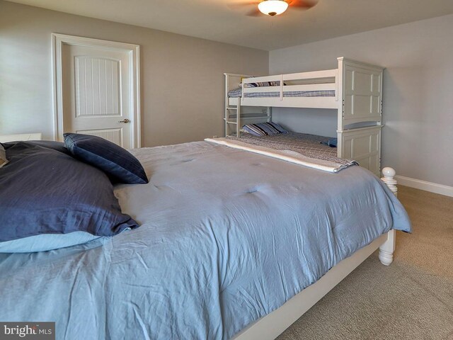 37529 Atlantic Ave Unit 11, Rehoboth Beach, DE 19971 - bedroom featuring carpet floors, baseboards, and a ceiling fan