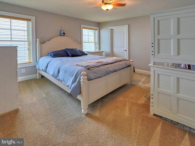 37529 Atlantic Ave Unit 11, Rehoboth Beach, DE 19971 - bedroom featuring light colored carpet and baseboards