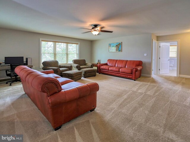37529 Atlantic Ave Unit 11, Rehoboth Beach, DE 19971 - living area with carpet flooring, ceiling fan, an office area, and baseboards