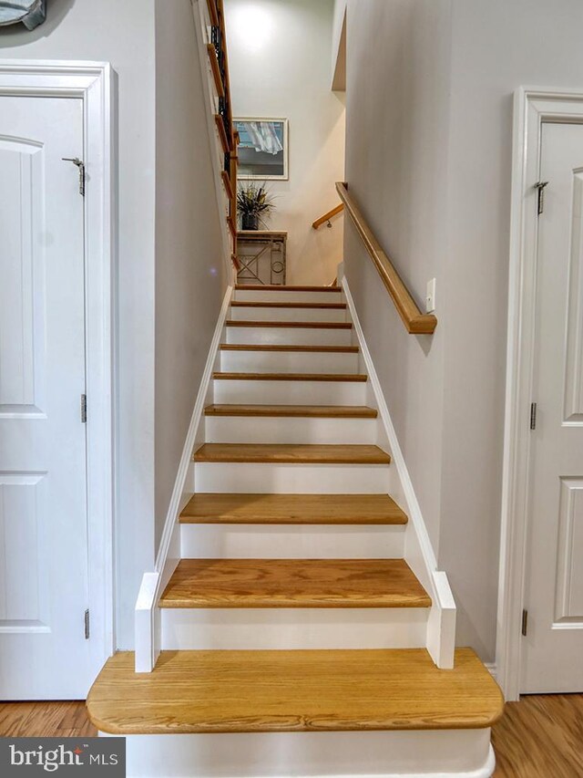 37529 Atlantic Ave Unit 11, Rehoboth Beach, DE 19971 - stairway featuring wood finished floors