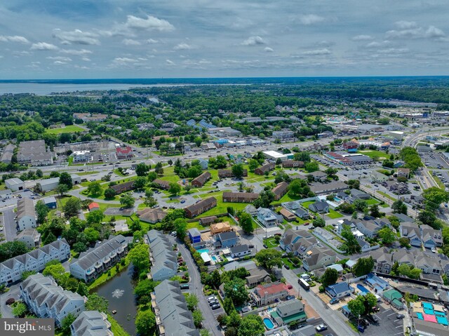 37529 Atlantic Ave Unit 11, Rehoboth Beach, DE 19971 - aerial view of property and surrounding area with a large body of water and nearby suburban area