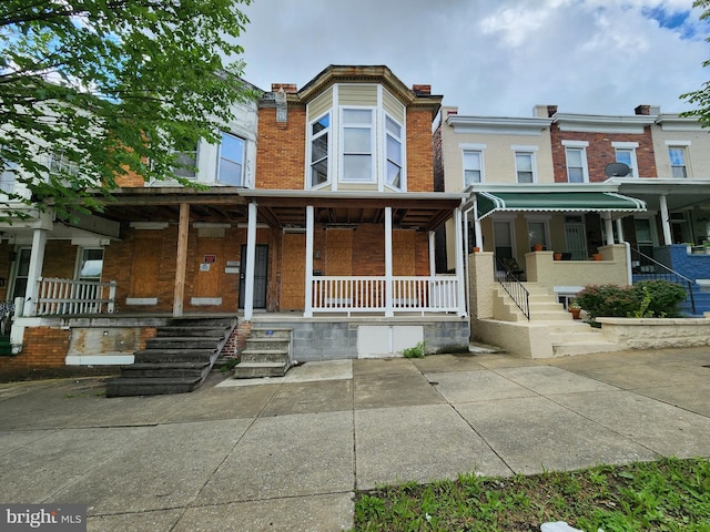 2341 Annapolis Rd, Baltimore, MD 21230 - view of property with a porch and brick siding