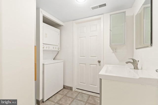 374 Shurs Ln Unit 304, Philadelphia, PA 19128 - washroom featuring stacked washing machine and dryer