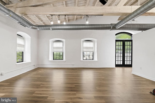 374 Shurs Ln Unit 304, Philadelphia, PA 19128 - empty room with track lighting, healthy amount of natural light, and wood finished floors