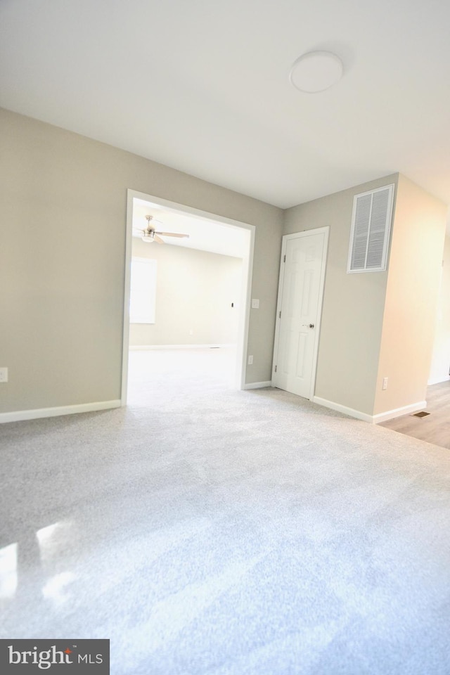 307 4th St, Seaford, DE 19973 - spare room with baseboards, light carpet, and ceiling fan