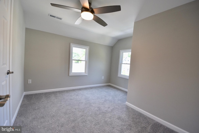 307 4th St, Seaford, DE 19973 - empty room featuring vaulted ceiling, a ceiling fan, carpet flooring, and baseboards