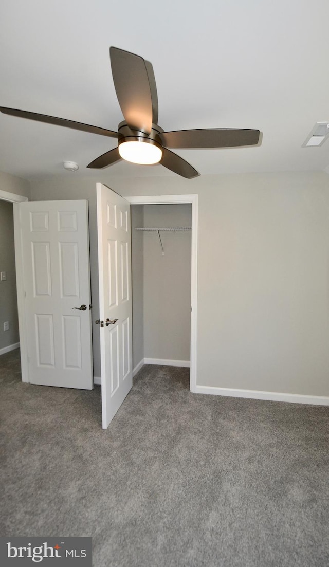 307 4th St, Seaford, DE 19973 - unfurnished bedroom with carpet, a closet, baseboards, and a ceiling fan