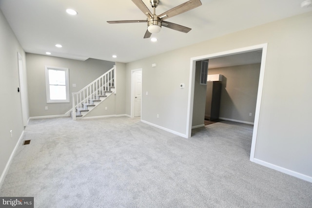 307 4th St, Seaford, DE 19973 - spare room featuring stairway, baseboards, a ceiling fan, carpet flooring, and recessed lighting