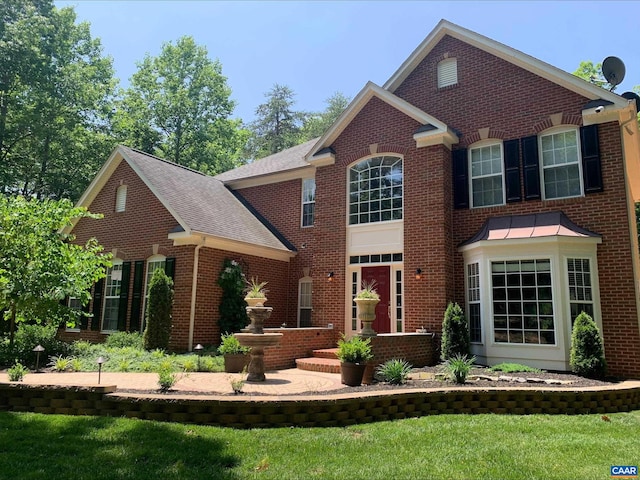 797 Willow Ridge Rd, Troy, VA 22974 - view of front facade featuring brick siding, a front lawn, and roof with shingles
