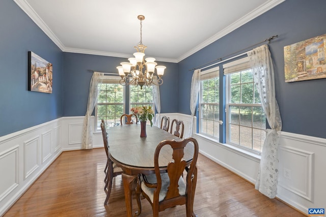 797 Willow Ridge Rd, Troy, VA 22974 - dining room featuring plenty of natural light, a chandelier, a wainscoted wall, light wood finished floors, and crown molding