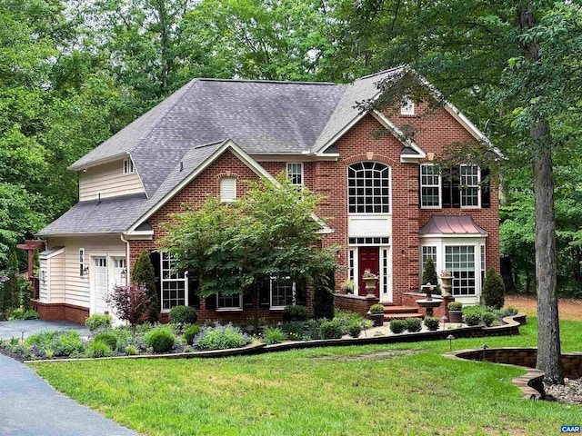 797 Willow Ridge Rd, Troy, VA 22974 - view of front of property with brick siding, a front lawn, and roof with shingles