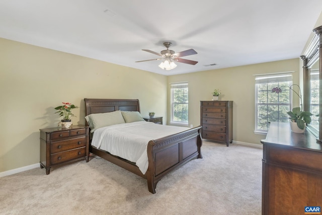 797 Willow Ridge Rd, Troy, VA 22974 - bedroom with light colored carpet, multiple windows, and a ceiling fan