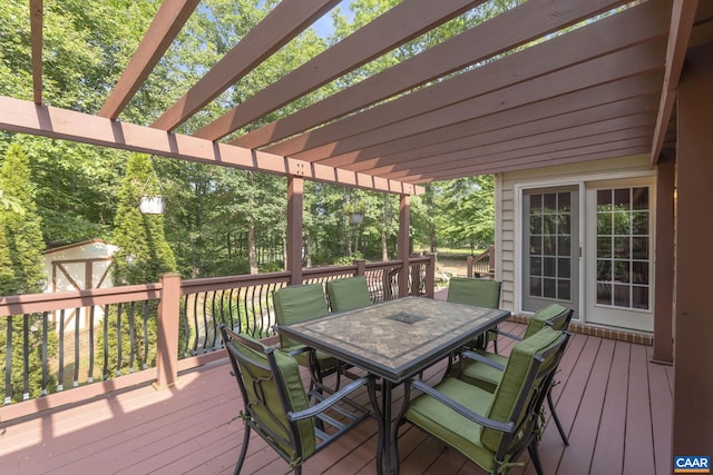 797 Willow Ridge Rd, Troy, VA 22974 - wooden terrace featuring outdoor dining space, a pergola, and a storage shed