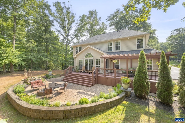 797 Willow Ridge Rd, Troy, VA 22974 - back of house with a pergola, a patio area, an outdoor fire pit, a wooden deck, and a shingled roof