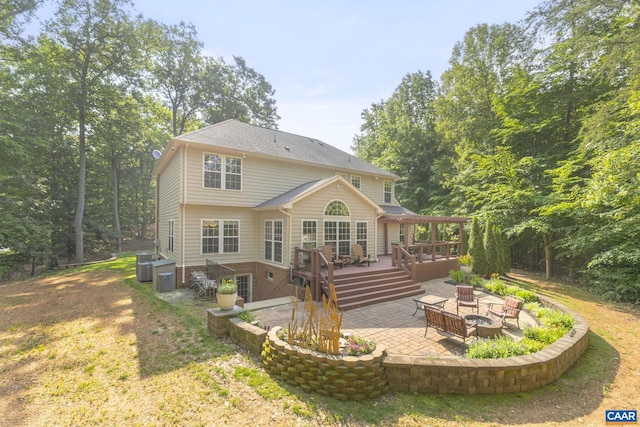 797 Willow Ridge Rd, Troy, VA 22974 - rear view of property featuring a patio, a deck, and a fire pit