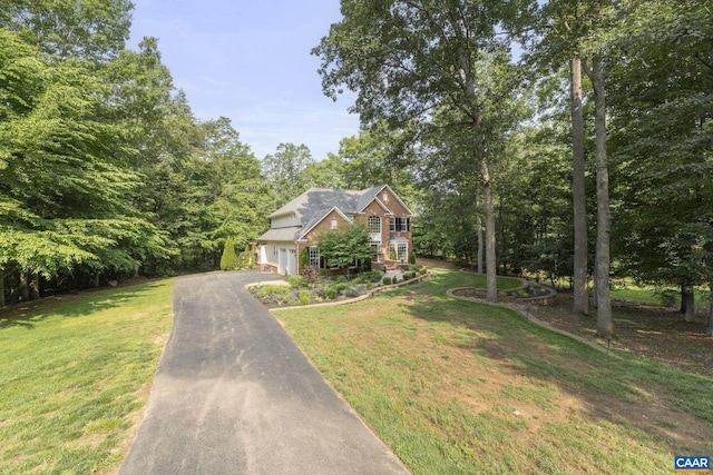 797 Willow Ridge Rd, Troy, VA 22974 - traditional-style home featuring asphalt driveway, a front lawn, and an attached garage