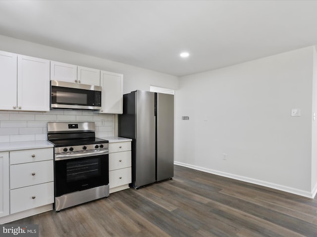 47 Picture Mountain Dr, Martinsburg, WV 25404 - kitchen with appliances with stainless steel finishes, light countertops, dark wood-style flooring, and recessed lighting