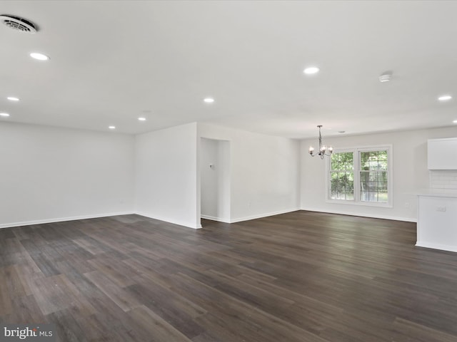 47 Picture Mountain Dr, Martinsburg, WV 25404 - unfurnished living room with a chandelier, dark wood-style floors, and recessed lighting