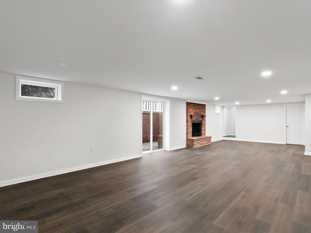 47 Picture Mountain Dr, Martinsburg, WV 25404 - unfurnished living room with a brick fireplace, recessed lighting, and dark wood-style floors