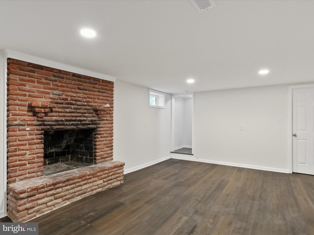 47 Picture Mountain Dr, Martinsburg, WV 25404 - unfurnished living room with dark wood-type flooring, a fireplace, and recessed lighting