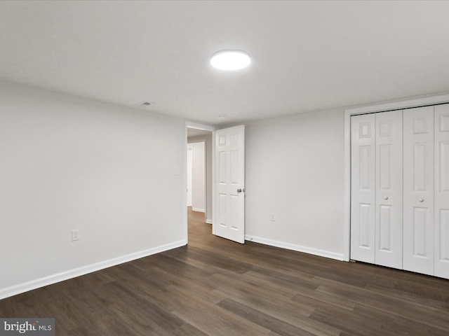 47 Picture Mountain Dr, Martinsburg, WV 25404 - unfurnished bedroom featuring dark wood-style floors and a closet