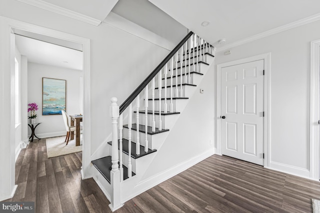 1225 Harper Ave, Woodlyn, PA 19094 - staircase featuring wood finished floors, crown molding, and baseboards