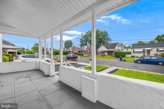 1225 Harper Ave, Woodlyn, PA 19094 - covered porch with a residential view