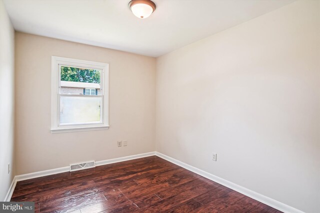 17817 Greentree Ln, Hagerstown, MD 21740 - spare room featuring dark wood-style floors and baseboards