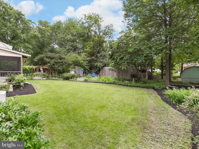 905 Peele Pl, Alexandria, VA 22304 - view of green lawn featuring a sunroom