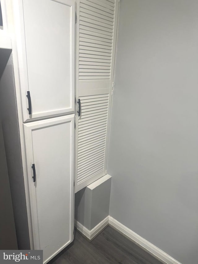 1409 Barrett Rd, Baltimore, MD 21207 - detailed view of baseboards and wood finished floors