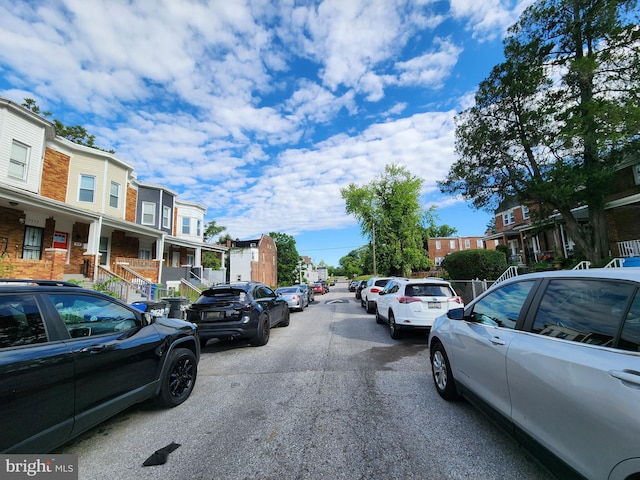 3827 Cottage Ave, Baltimore, MD 21215 - view of asphalt street with a residential view