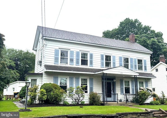1512 River Rd, Upper Black Eddy, PA 18972 - view of front of home featuring covered porch, a front lawn, a shingled roof, and a chimney