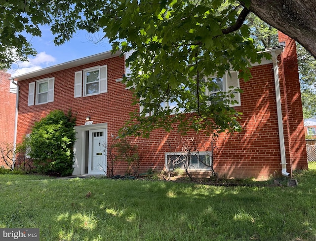 6412 24th St N, Arlington, VA 22207 - view of front of property with brick siding and a front yard
