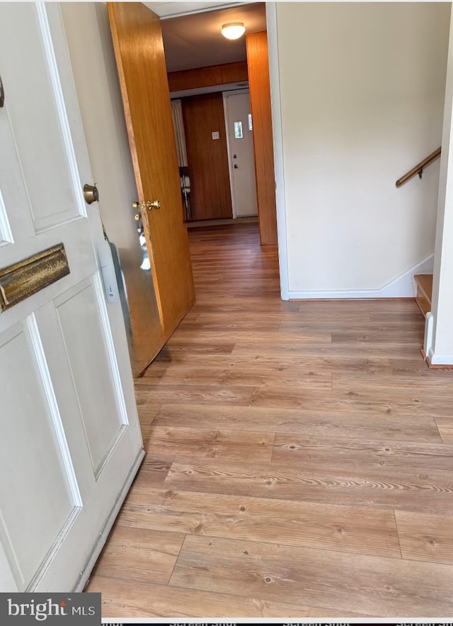 6412 24th St N, Arlington, VA 22207 - corridor featuring light wood-type flooring and stairs