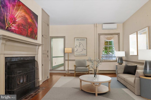 28 The Strand, New Castle, DE 19720 - living area with wood finished floors, a wall mounted AC, and baseboard heating