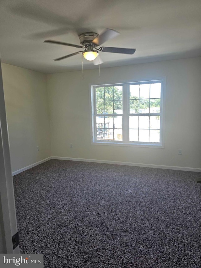 241 Rojan Rd Unit 114, Dover, DE 19901 - unfurnished room with baseboards, ceiling fan, and carpet